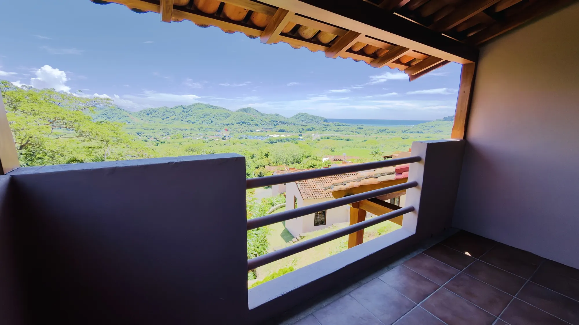 Upstairs balcony looking out over the hills to the Pacific