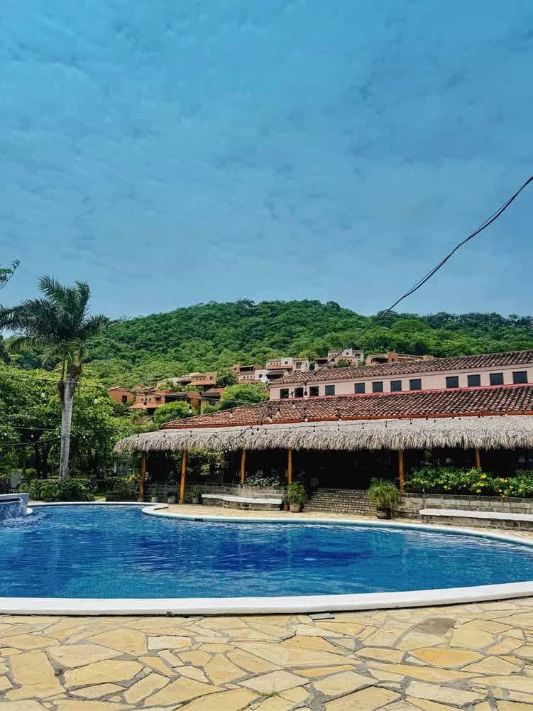 Terraza de Palermo under its thatched palapa roof